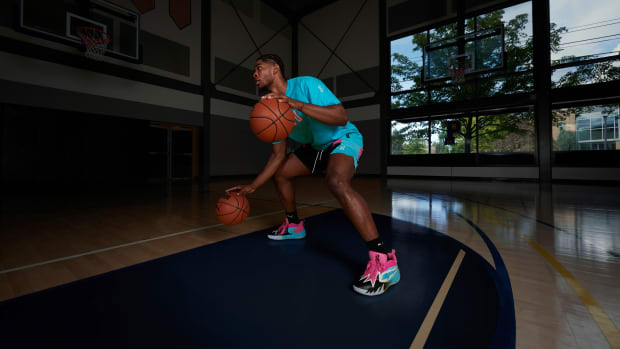 Scoot Henderson models blue and pink PUMA apparel.